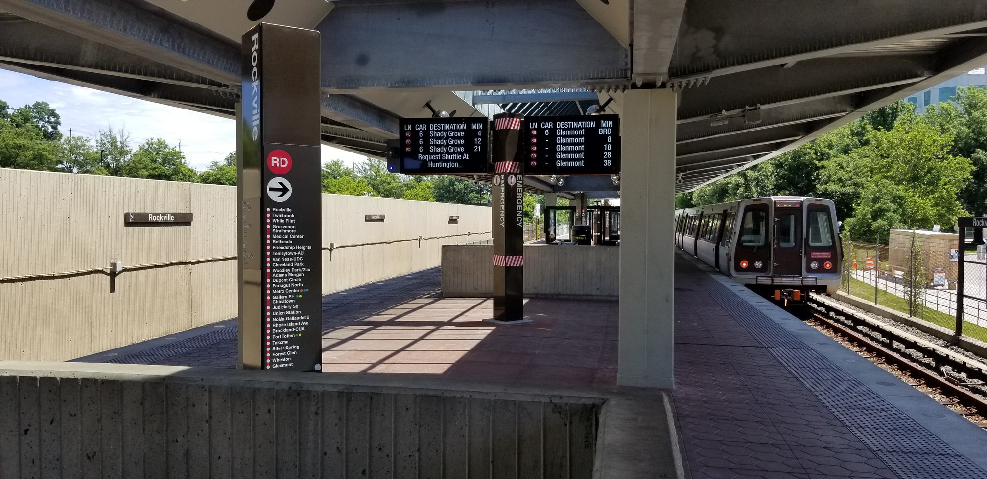 A Red Line train beside the platform at Rockville Metro station